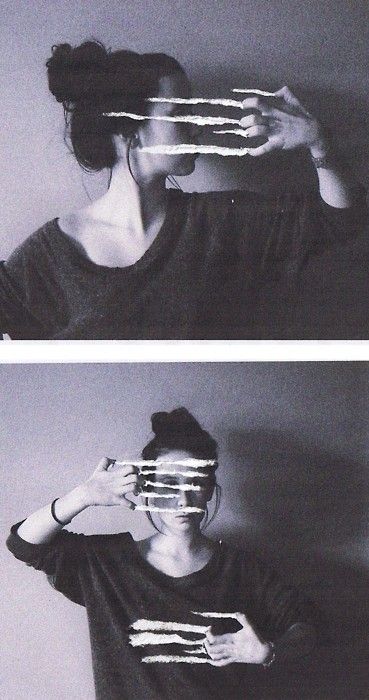 Black and white image of woman scratching