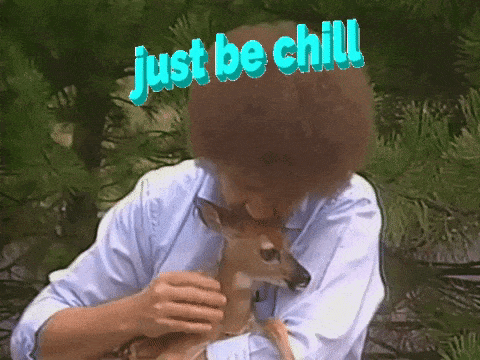 Bob Ross being chill with a fawn