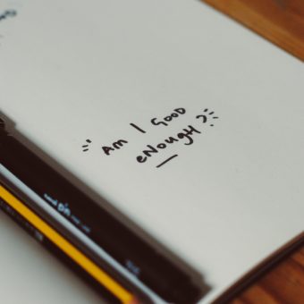 Cognitive Behavioural Therapy: A page reads "Am I enough"