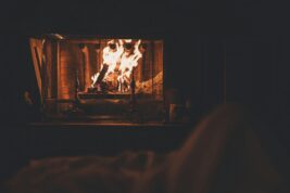 Bed By A Fire