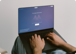 The Indigo Matchmaker home page is accessed from a laptop by someone sitting down